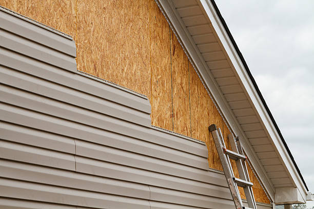 Professional Vinyl Siding technician working in Calvin, PA